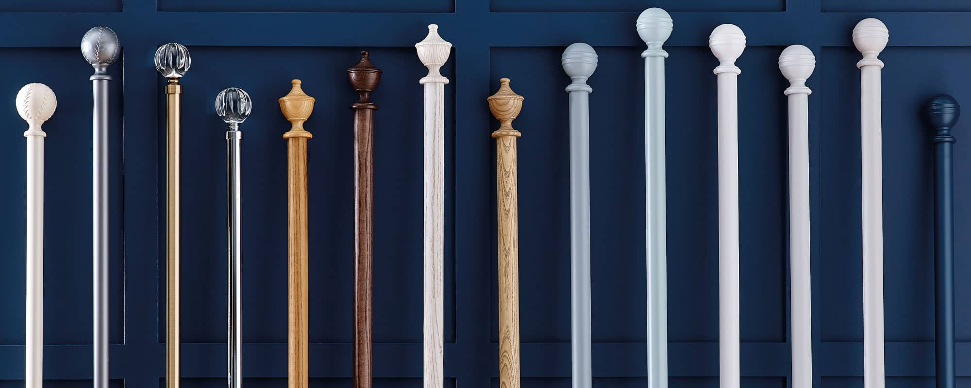 Range of wooden and metal curtain poles