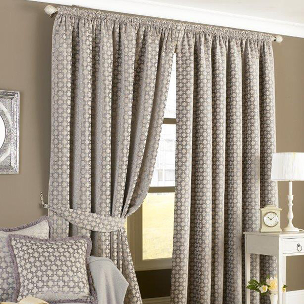 Grey curtains with tiebacks in Knutsford showroom