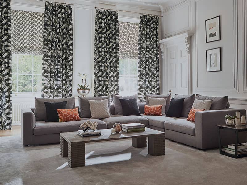 Ready made curtains and sofa in living room